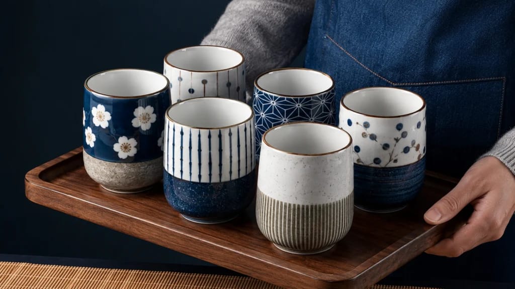 Authentic Japanese Ceramic Cups and Restaurant Tableware by Leletableware Malaysia Authentic Japanese ceramic cups and tableware collection displayed on wooden serving tray — imported Japanese diningware and restaurant tableware supplied by Leletableware, Malaysia wholesale Japanese ceramic supplier, branding project by Serah Siew
